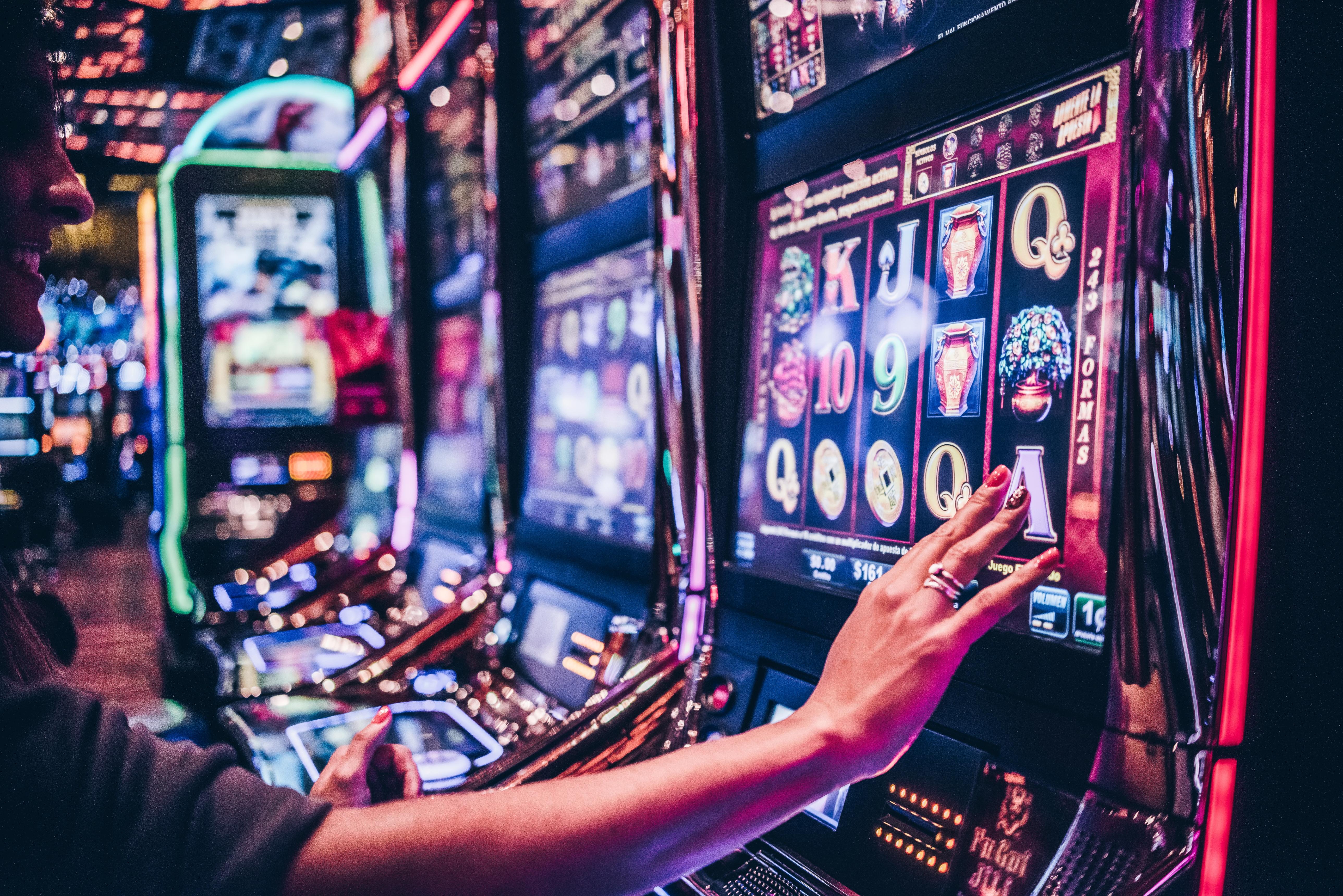 Enjoy Punta Del Este Ngoại thất bức ảnh A woman playing a slot machine